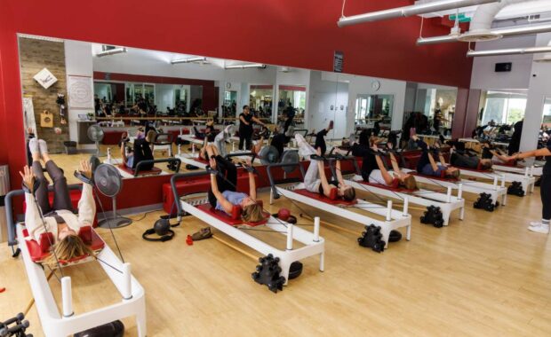 beginners in DC reformer Pilates class