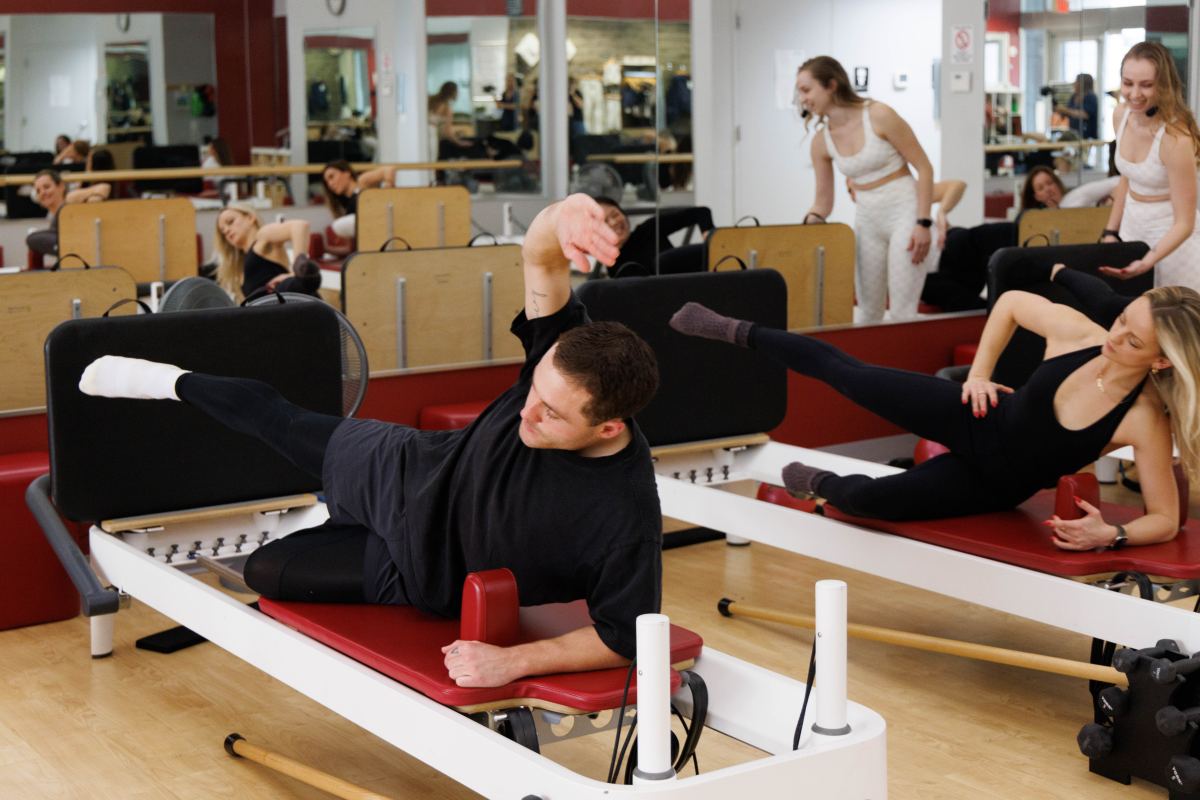 Potomac pilates class doing jump sides