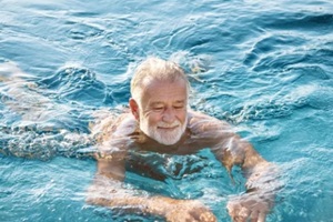 mature man in a swimming pool