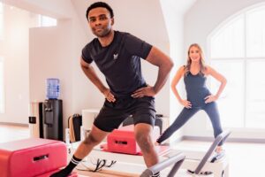 Michael speed skater on pilates reformer in Potomac, MD